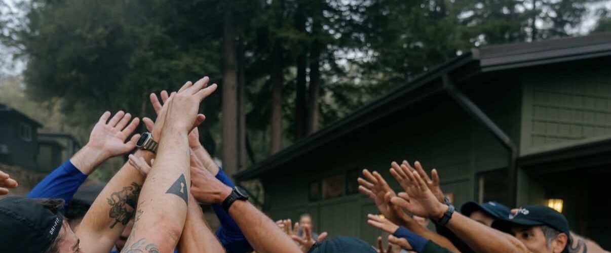 hands raised in the air.